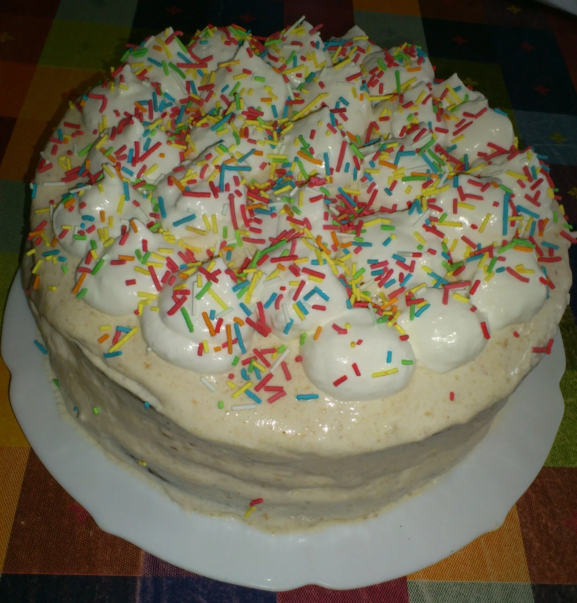 Coffee cake with mascarpone cream and peaches