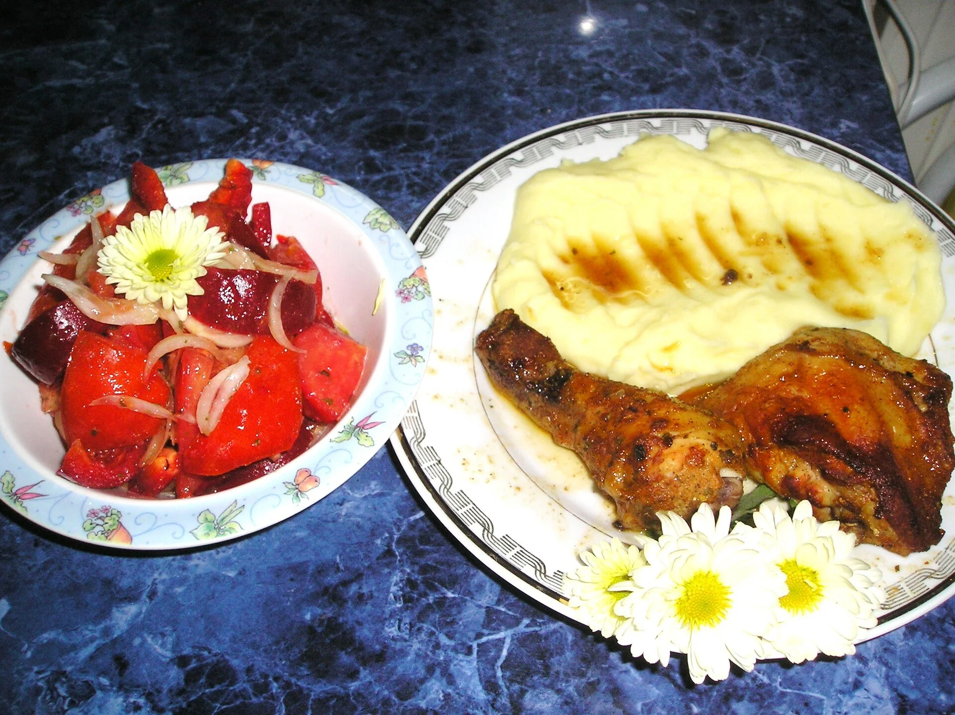 Tender chicken thighs with garlic and mashed potatoes