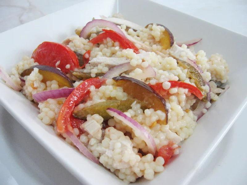 Chicken salad with plums and couscous