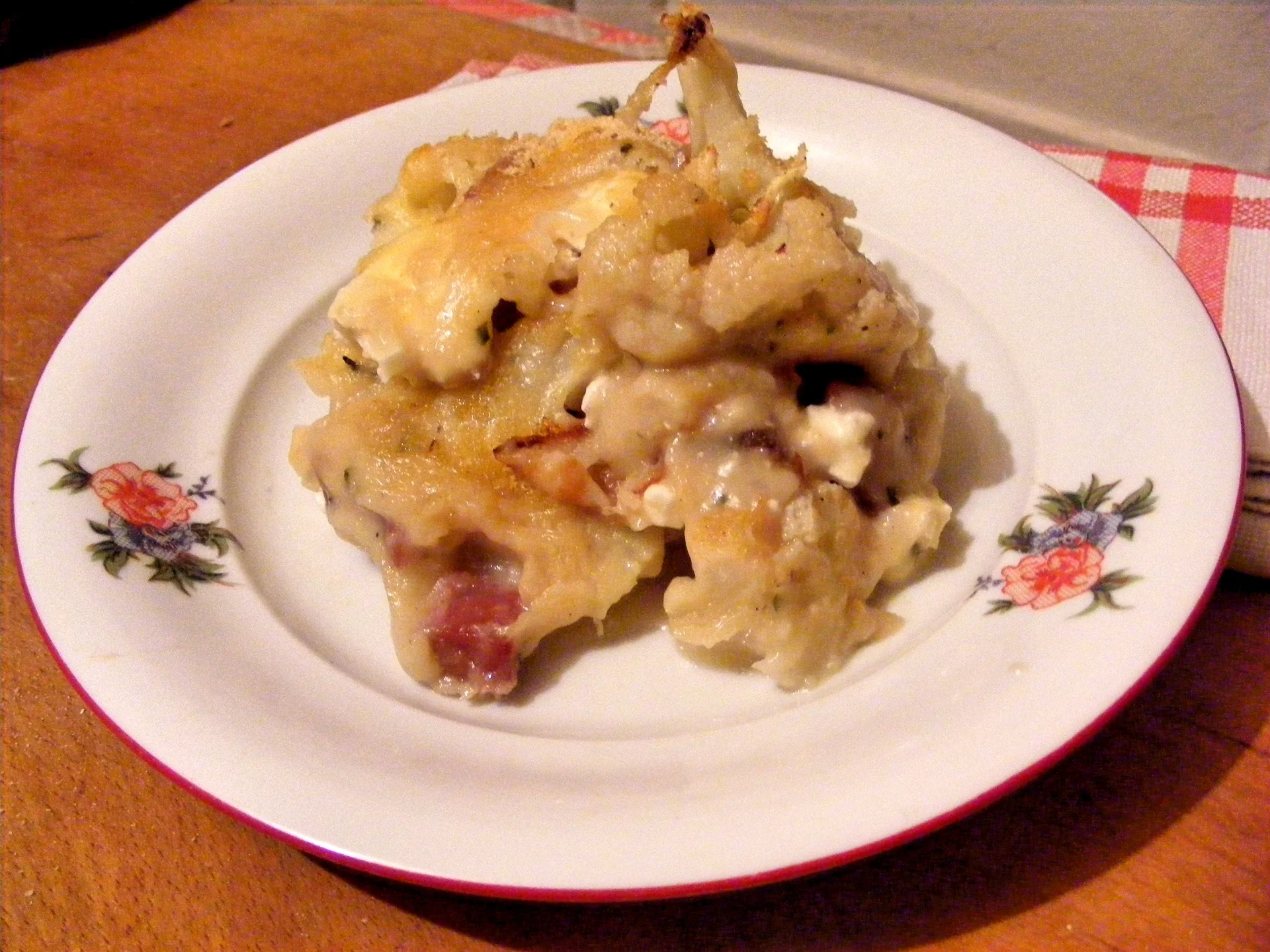 Cauliflower with cheese and ham