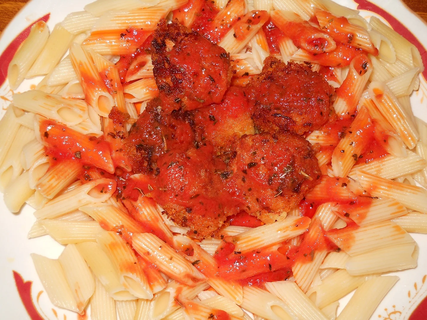 Mini penne with meatballs in sauce