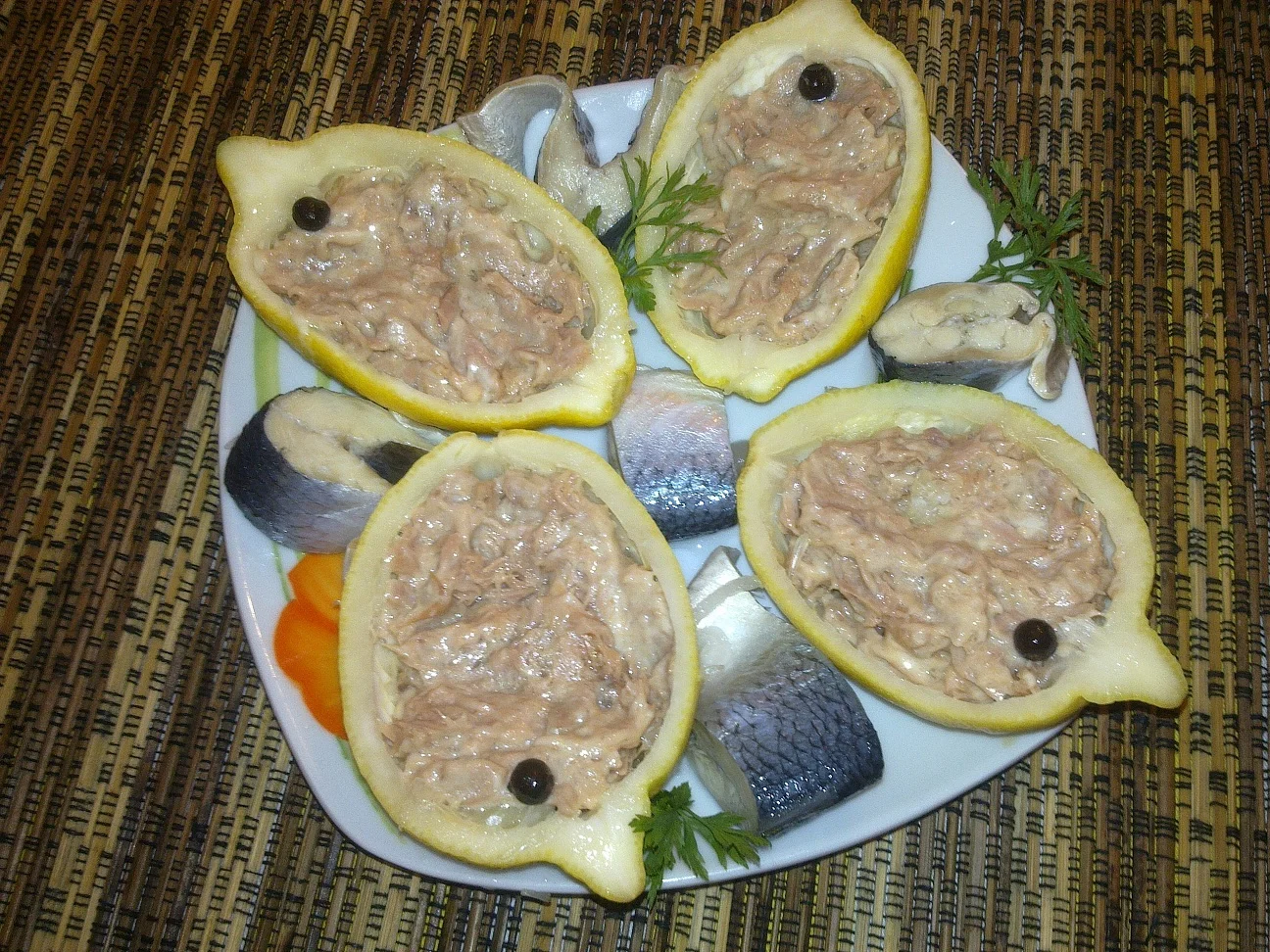 Sailing boats with tuna and herring