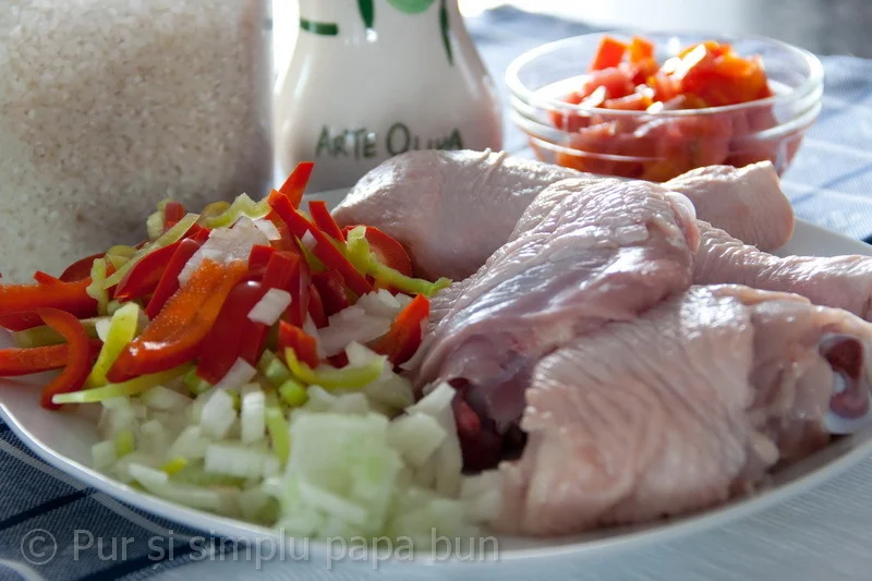 Rice pilaf with vegetables and chicken thighs