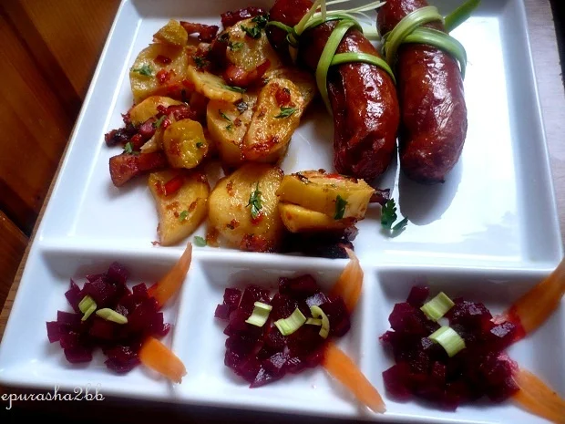 Rustic potatoes with sausages and pickles