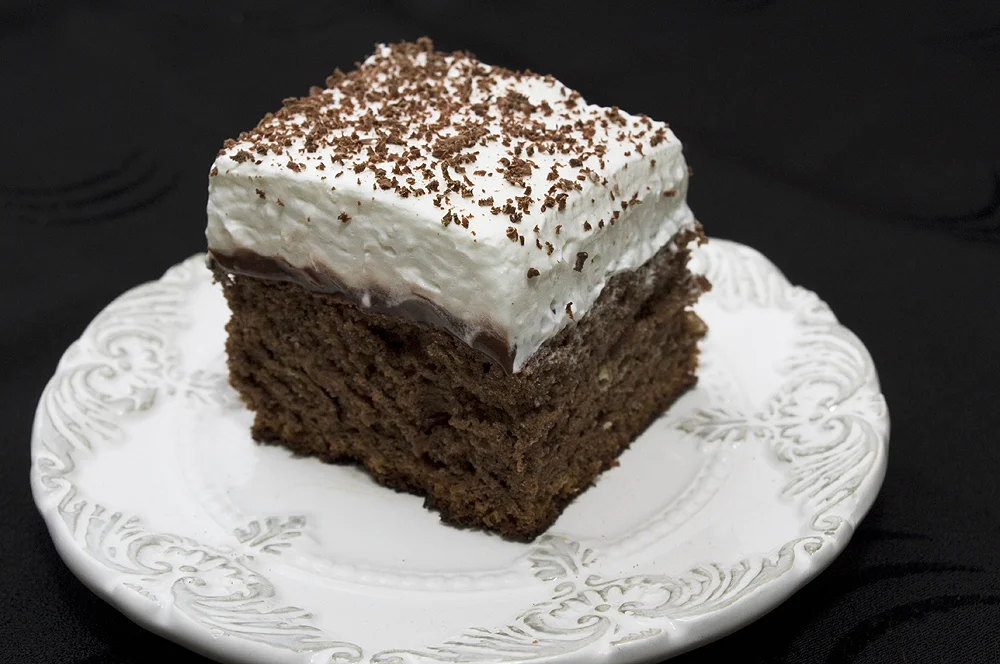 Fantastic cake with almonds and condensed milk foam