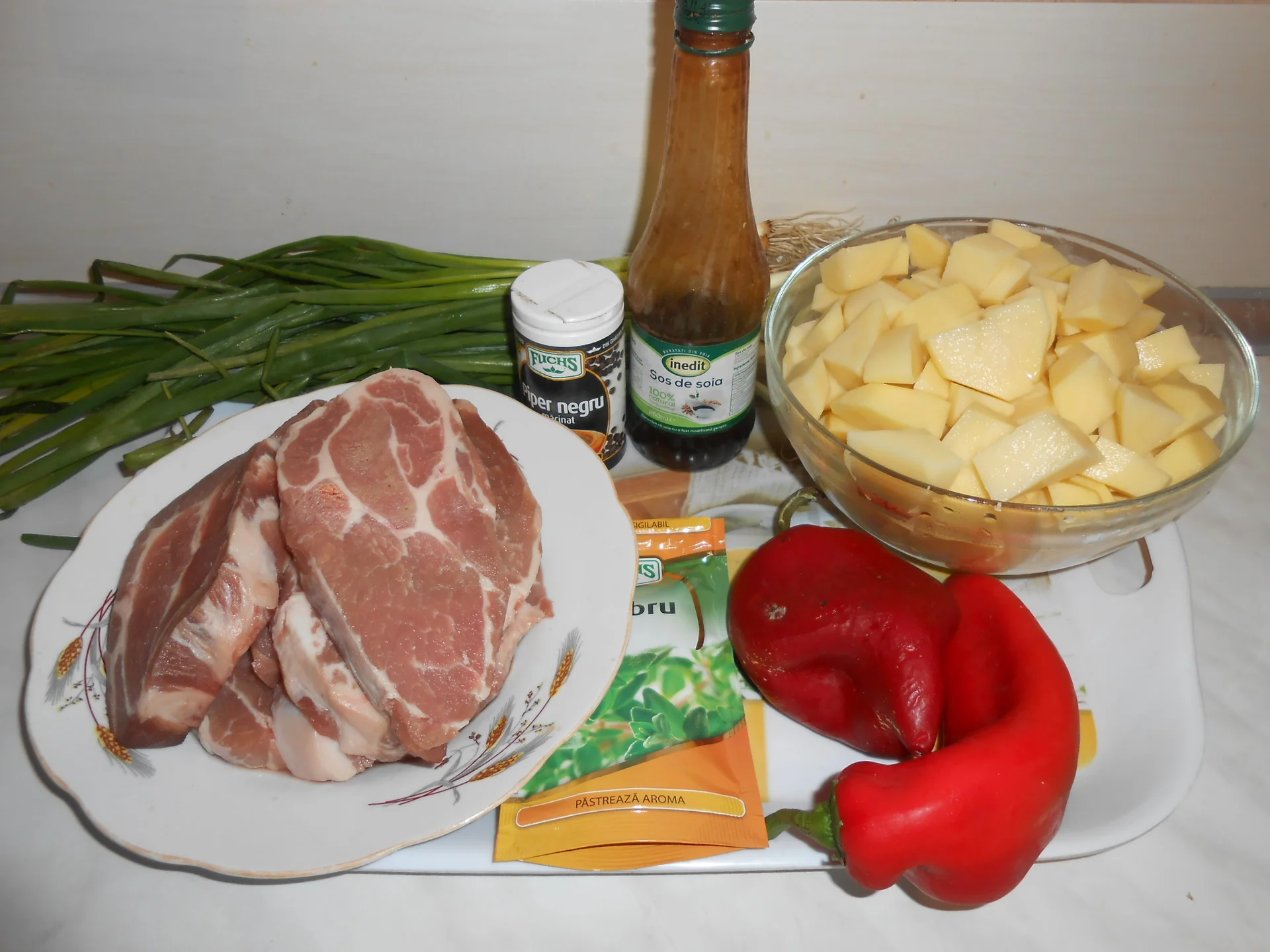 Oven-baked pork neck and pan-fried potatoes