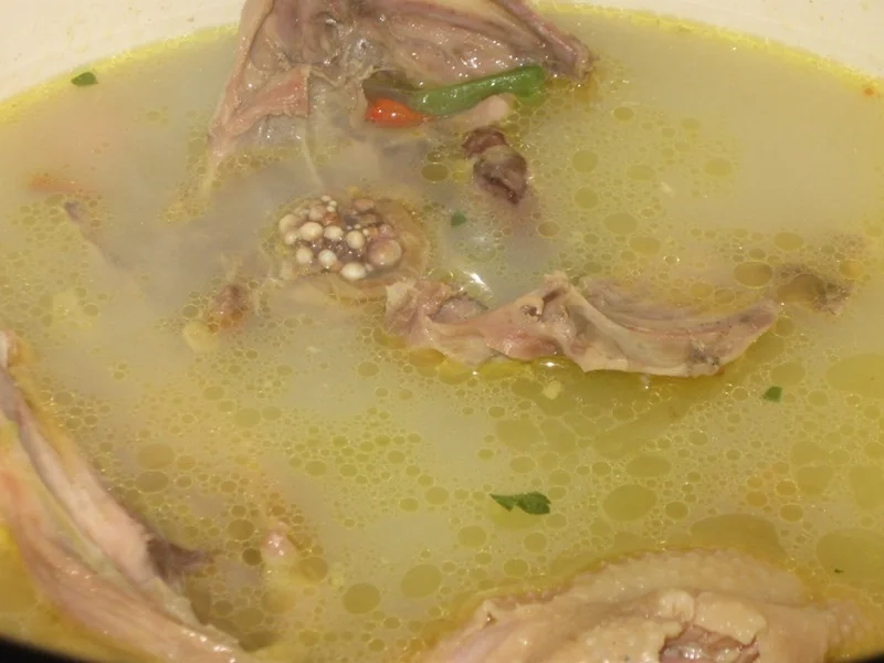 Chicken soup made from the rooster of Ina.