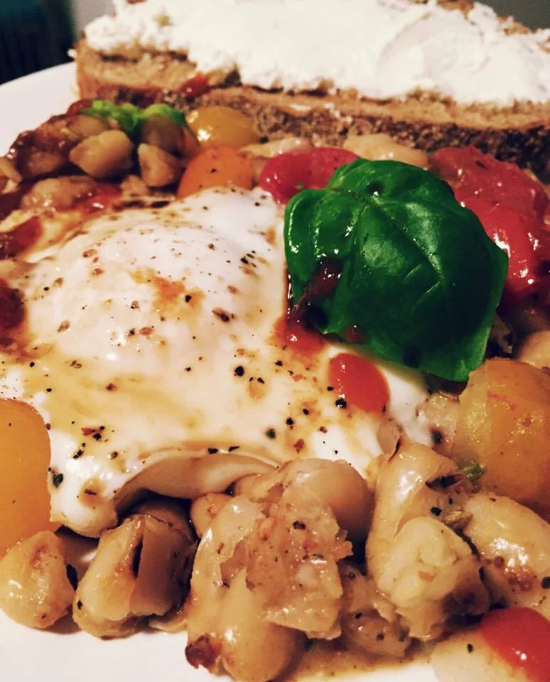 Eggs with beans and toast with ricotta