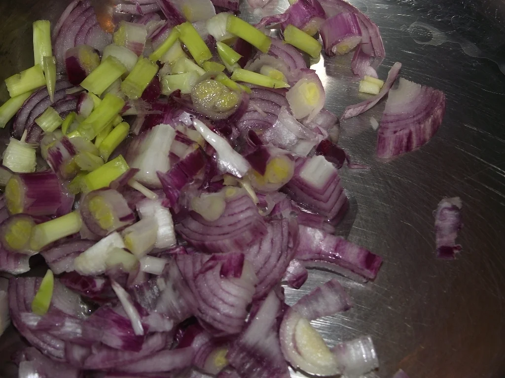 Meat pie with minced meat, mushrooms, and cheese