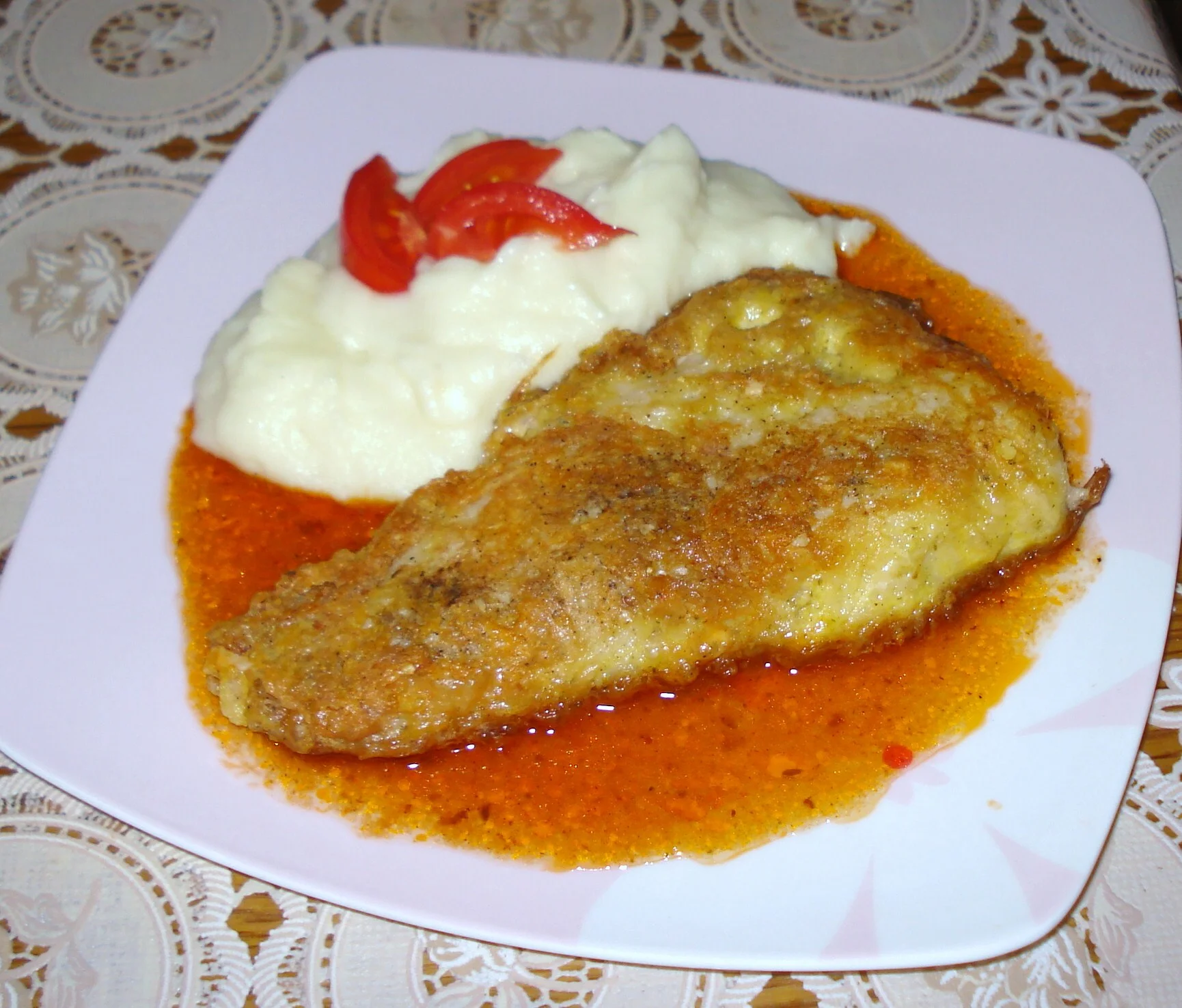 Pangasius fillet with spicy sauce