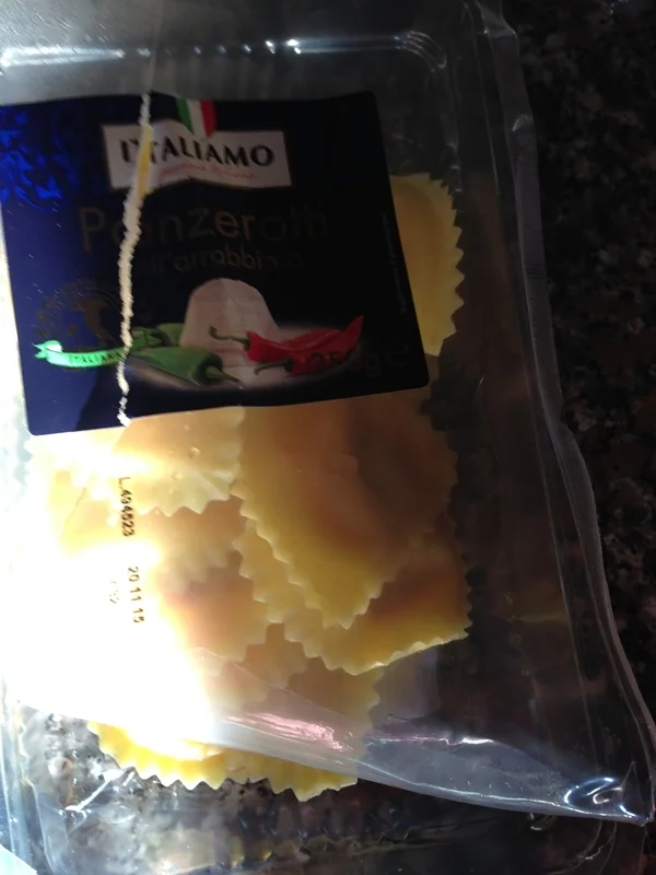 Panzerotti in tomato sauce with basil and parsley