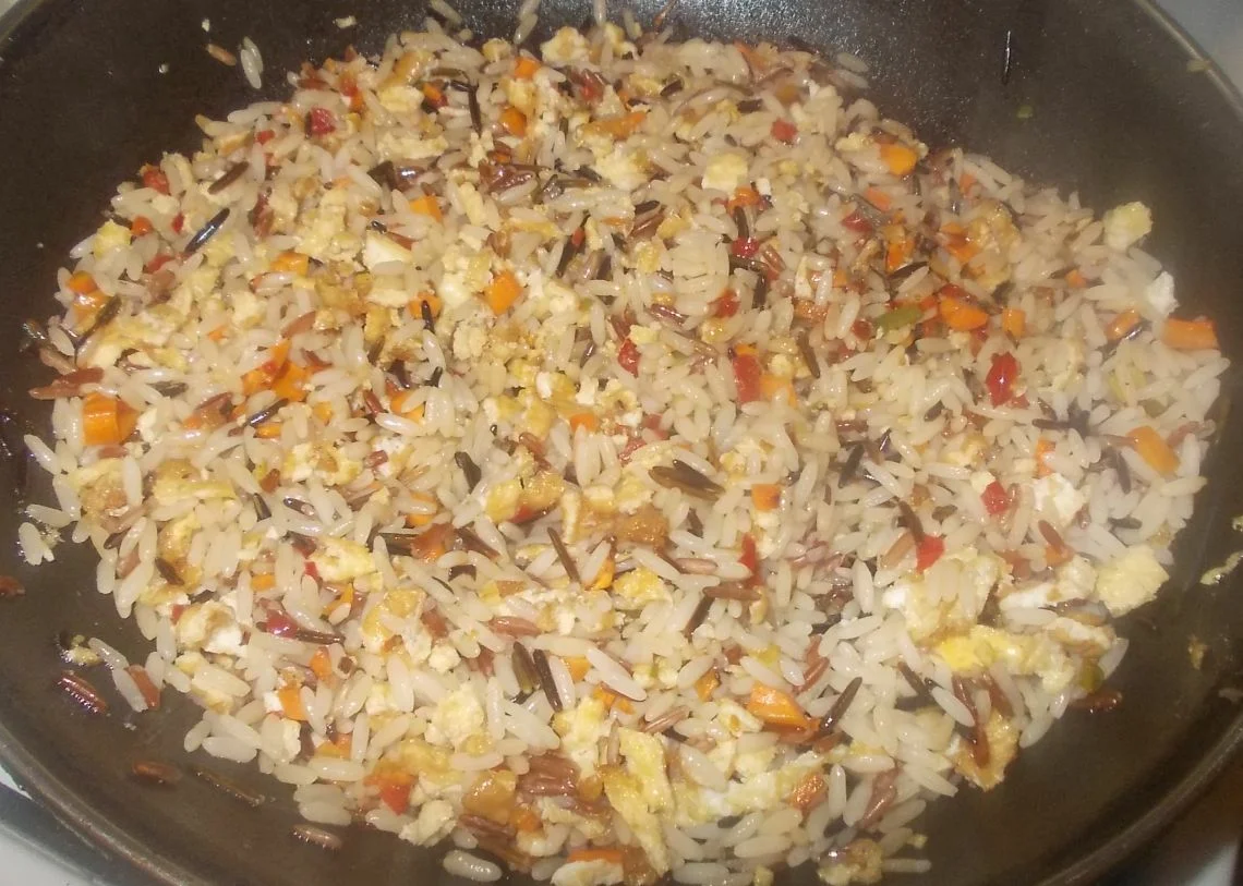 Salmon with fried rice and red curry sauce