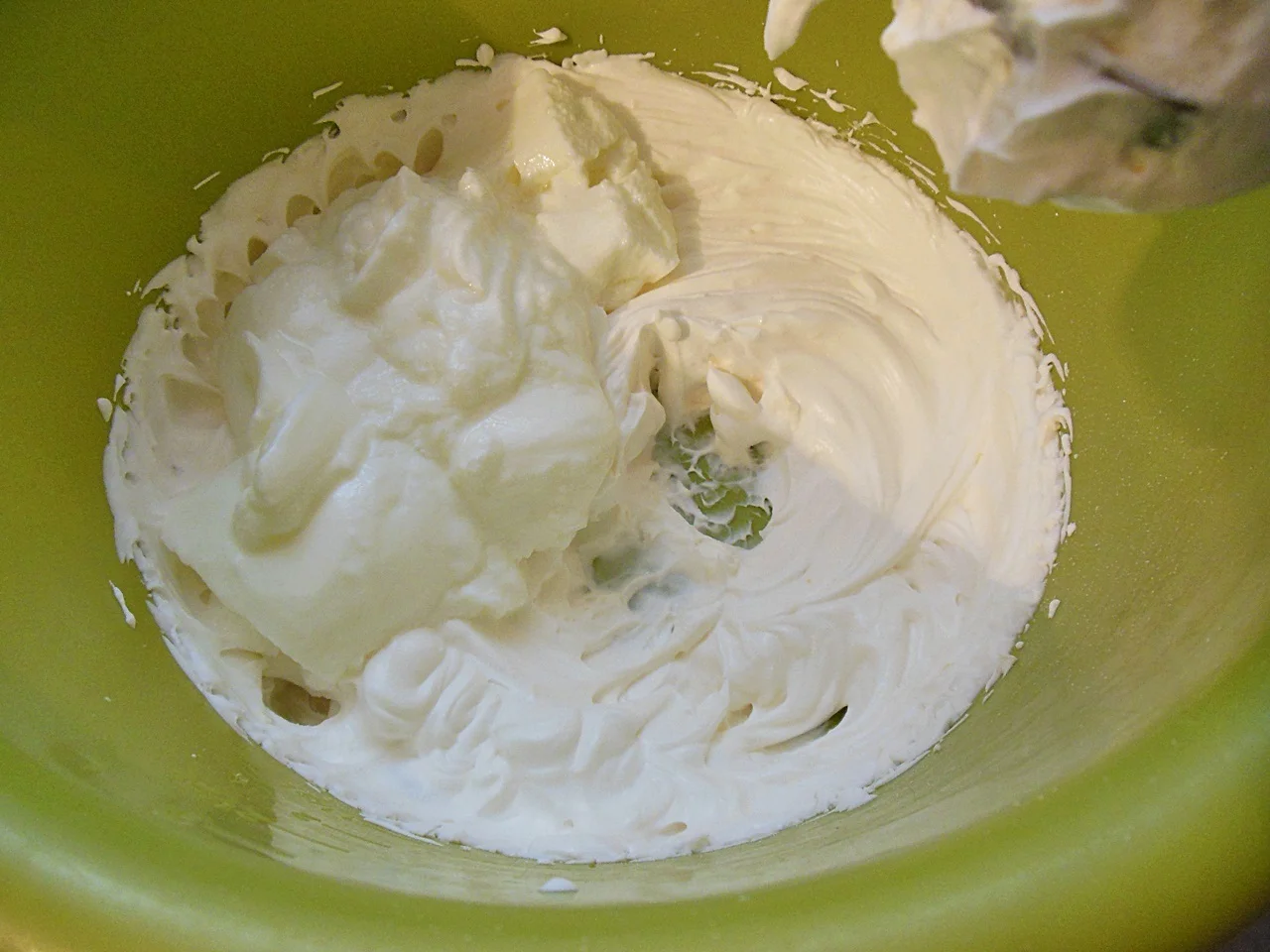 Dessert with yogurt cream, whipped cream, strawberries, and biscuits
