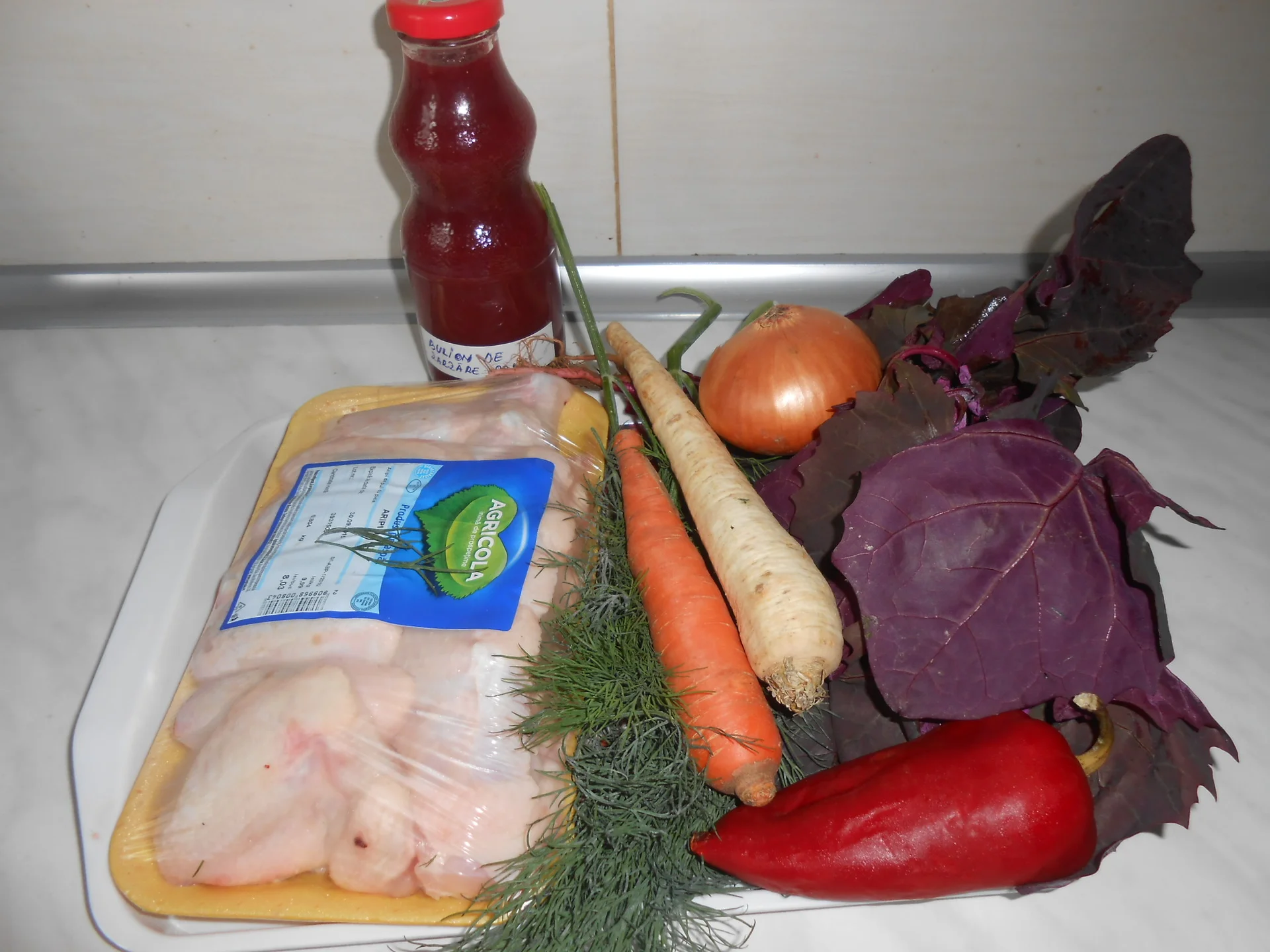 Chicken wing soup with red orache