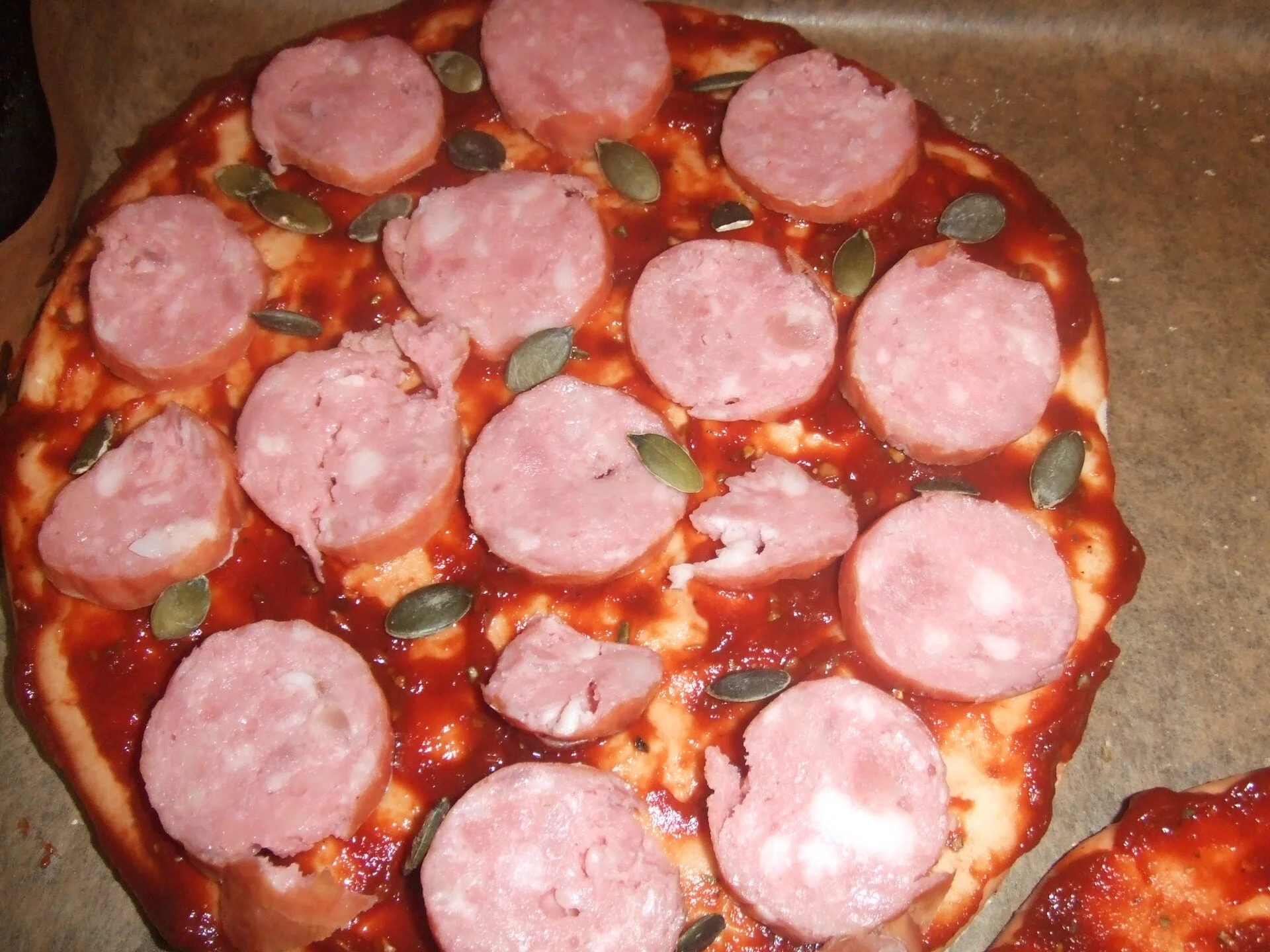 Salami Pizza with pumpkin seeds