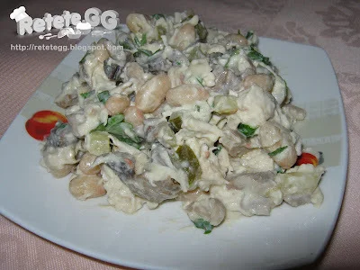 Chicken salad with mushrooms, beans, and pickles