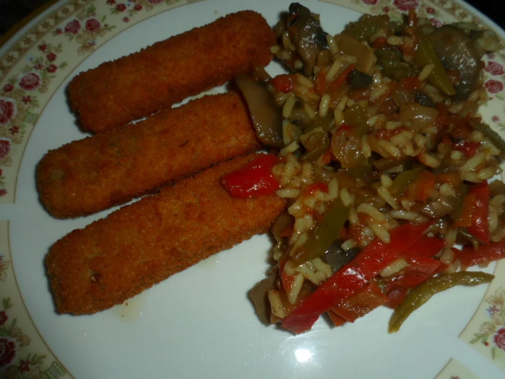 Rice with spicy vegetables and fish