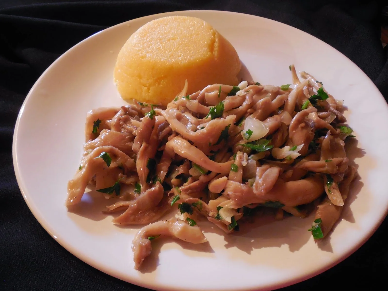 Oyster mushrooms with garlic and polenta