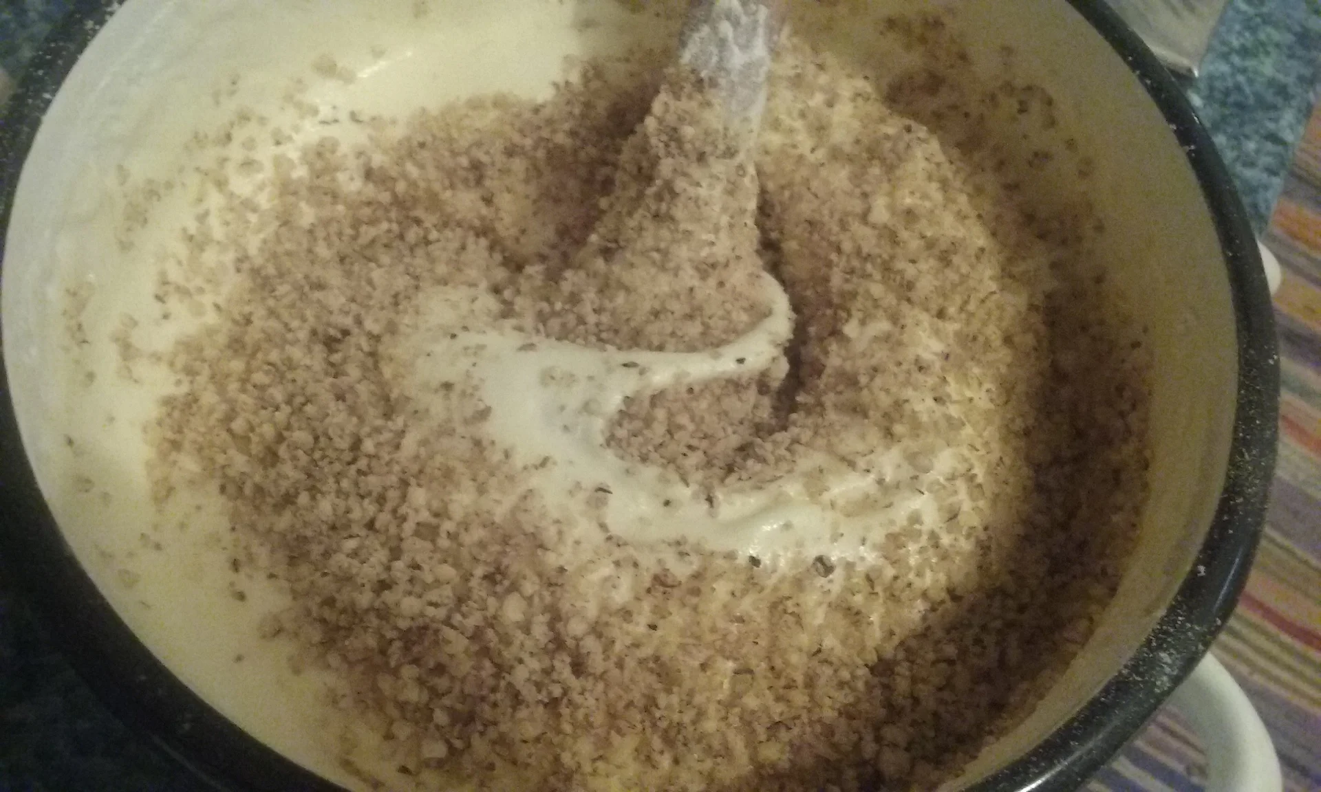 Nut cake with chocolate cream and red fruits