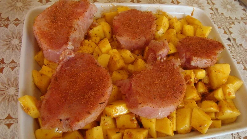 Chicken breast on a bed of potatoes
