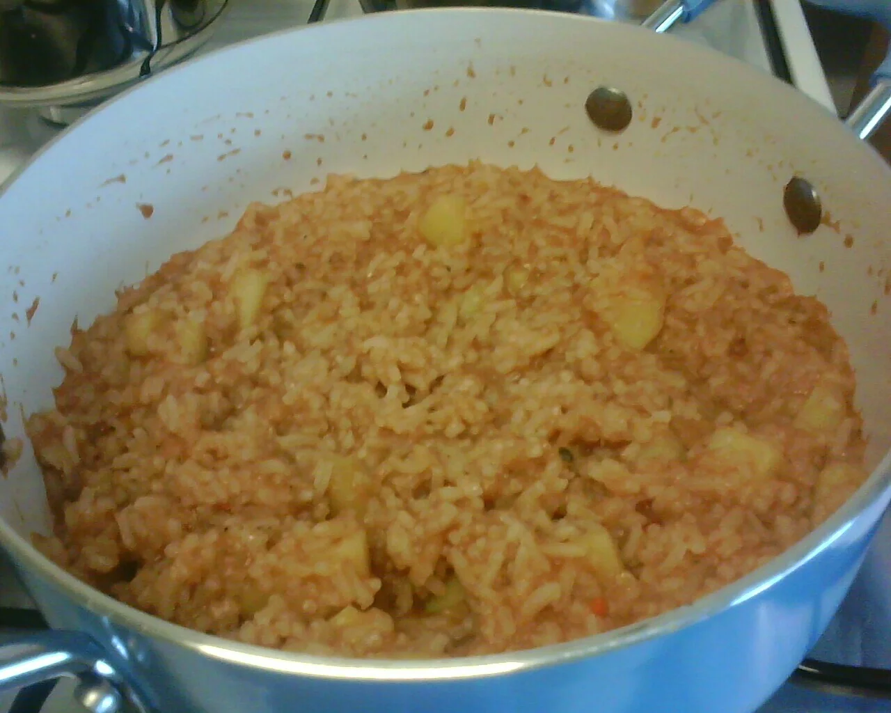 Rice with potatoes and rosemary