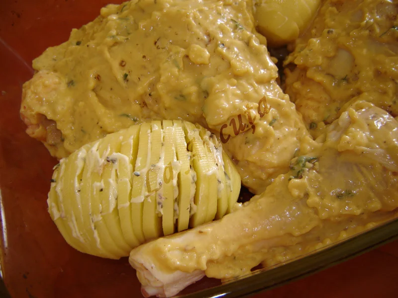 Chicken thighs with mustard and Hasselback potatoes
