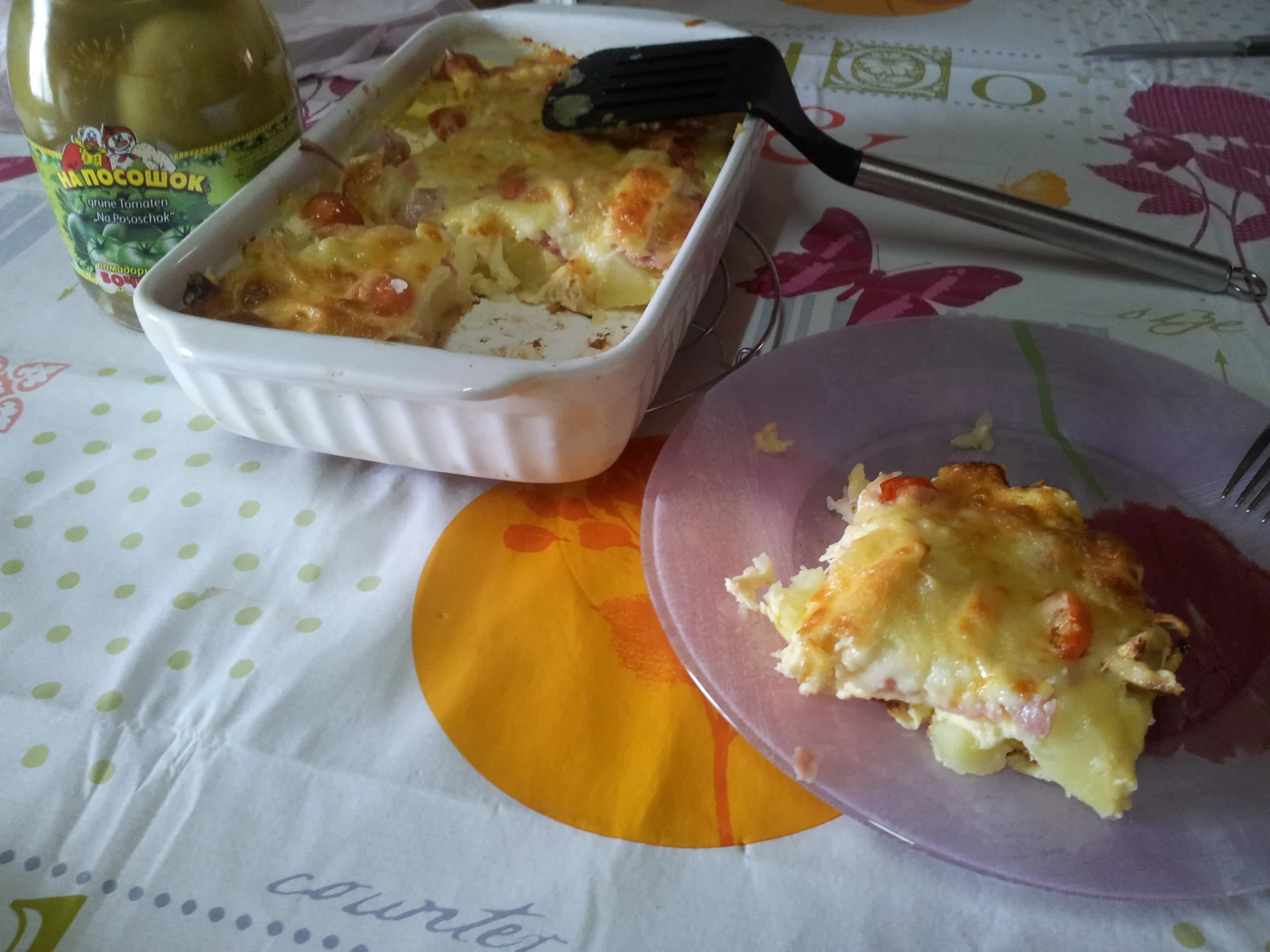 Oven-baked potatoes with chicken breast and cheese