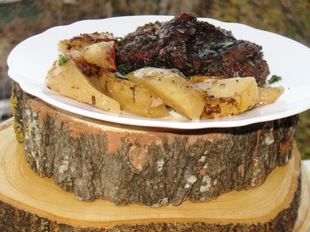 Roast lamb with baked potatoes