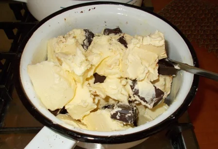 Black cake with cream cheese and cranberries