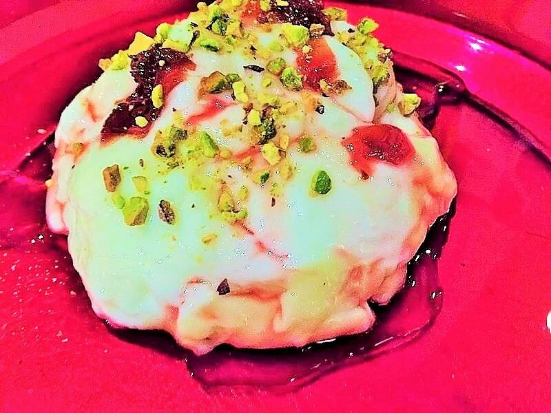 Cream in rose jam syrup