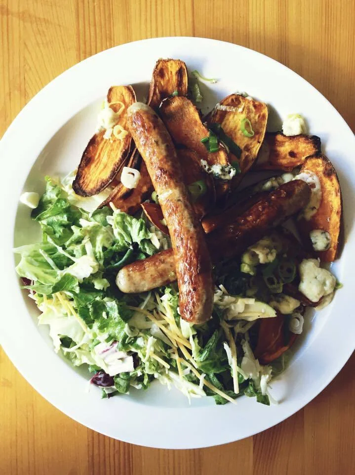 Sausages with sweet potato gratin and blue cheese
