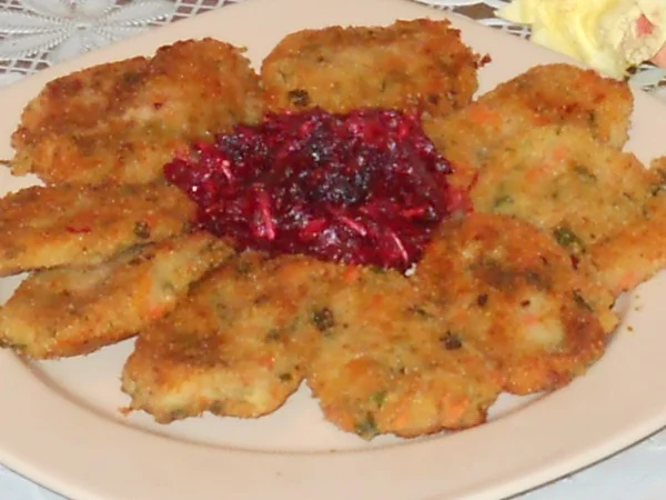 Vegetable fritters with red beet salad