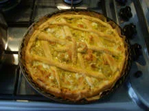 Tuna pie with onion, pepper, and cheese.