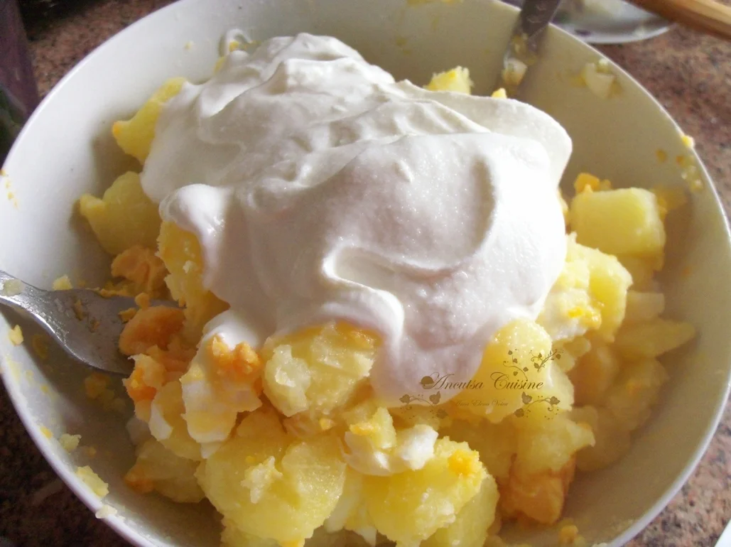 Potato salad with eggs and sour cream