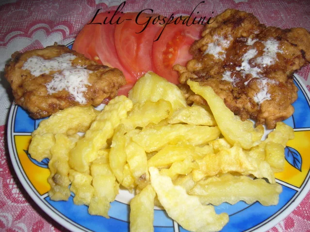 Pork schnitzels with parboiled fries