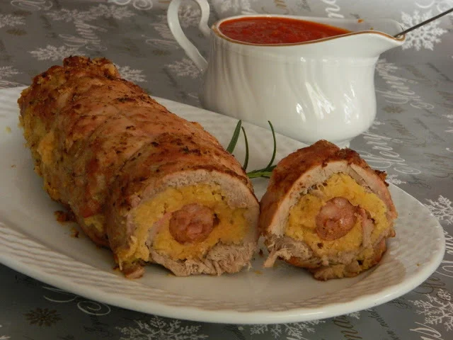 Rolled tenderloin with chickpea paste and smoked sausages