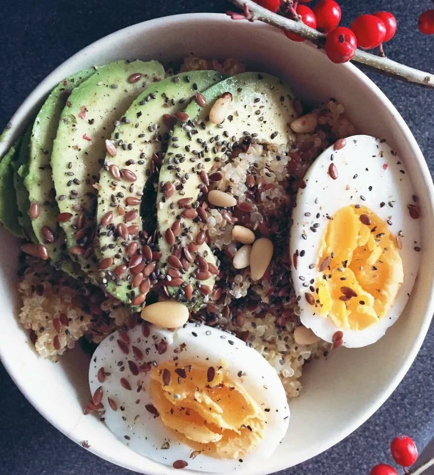 Breakfast with quinoa, egg, and avocado