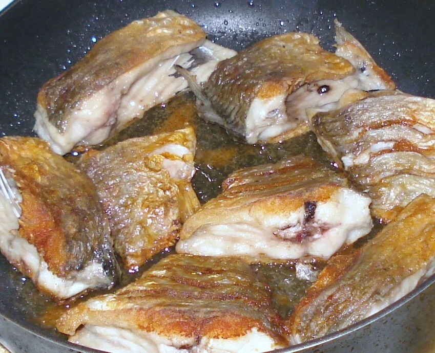 Carp with roasted pepper sauce