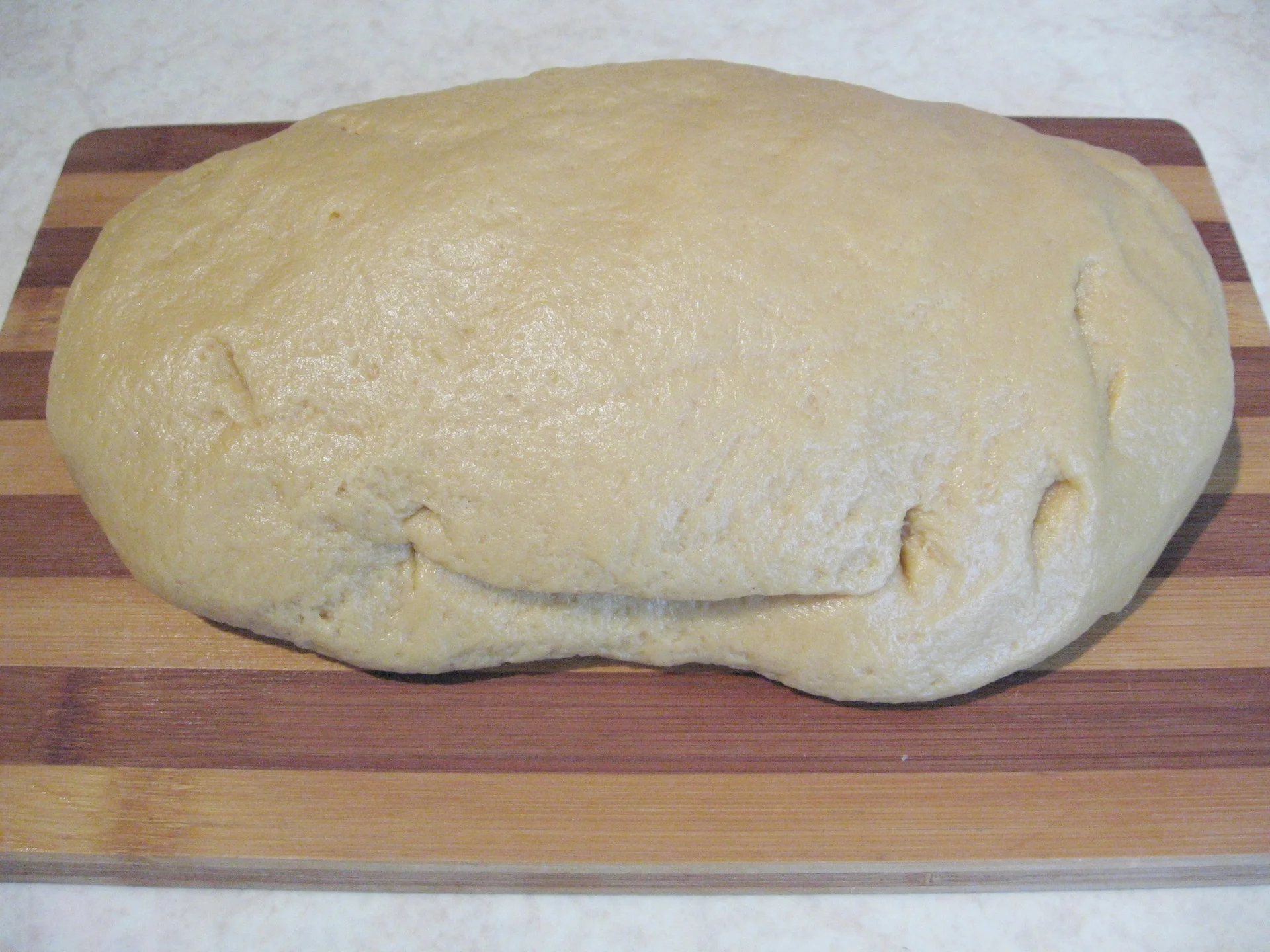 Caramel layer cake with peach cream cheese filling from compote