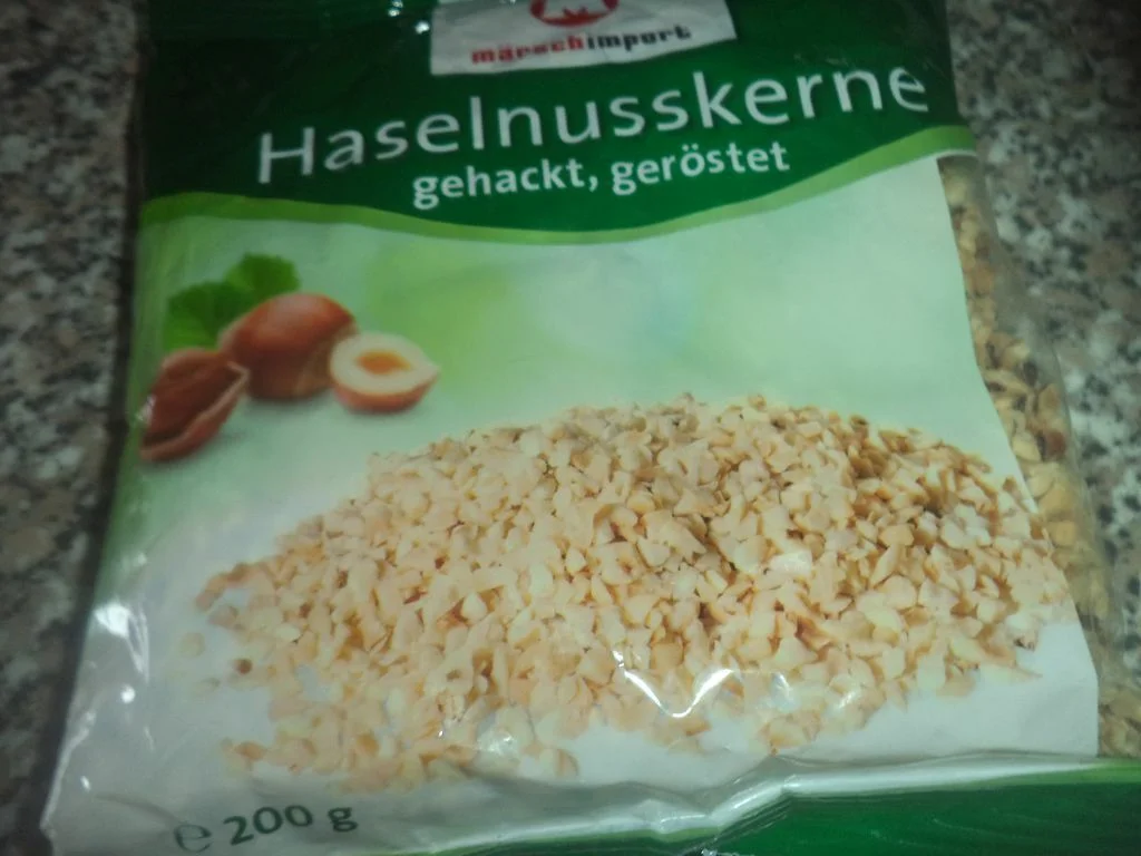 Vegan chocolate cake with jam and hazelnuts