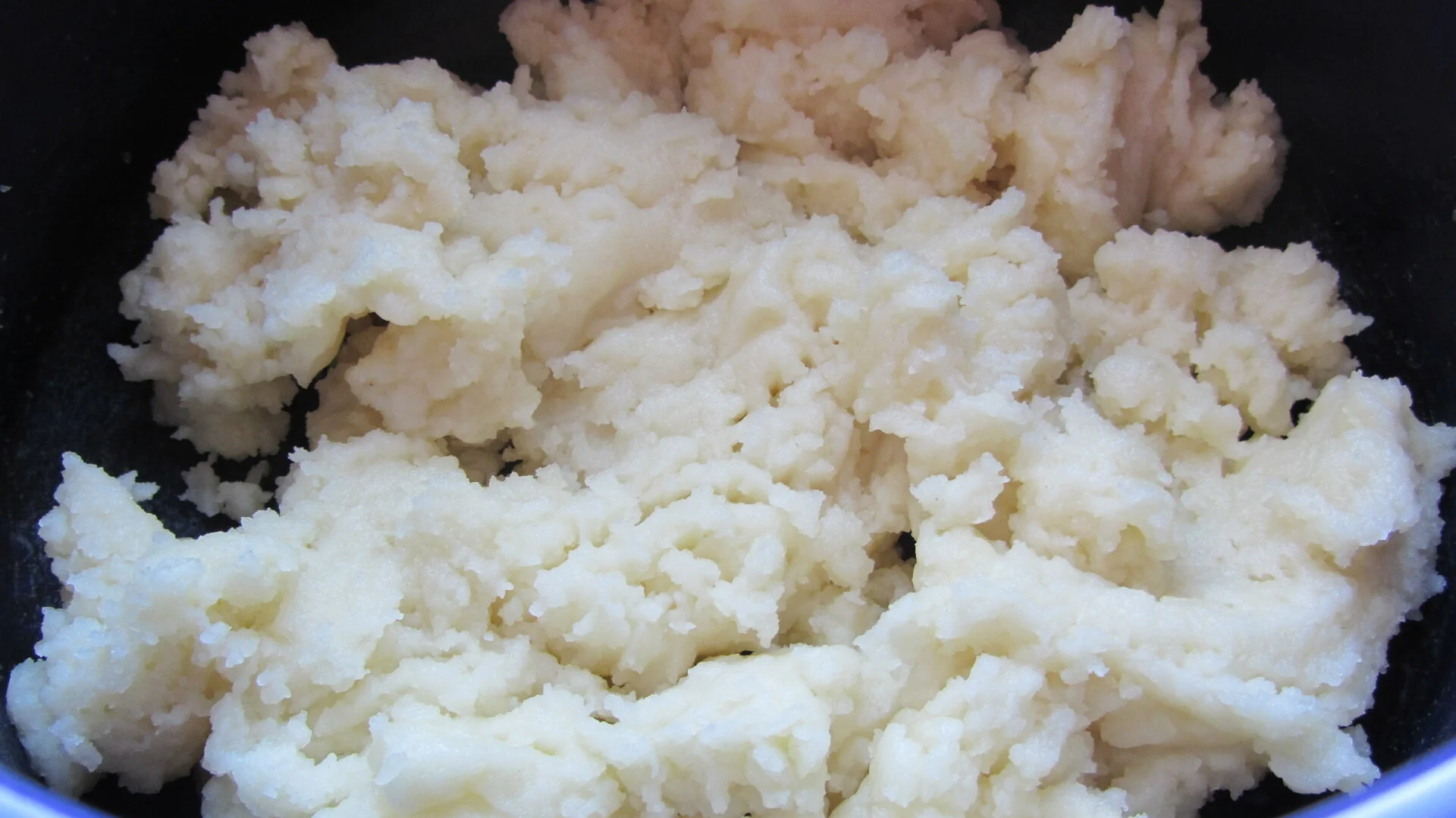 Eclairs with vanilla cream and raspberries