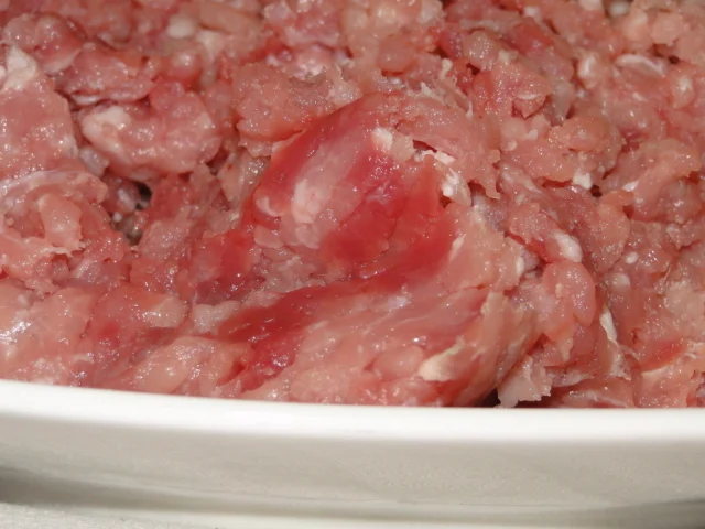 Stuffed tomatoes with pork and rice baked in the oven