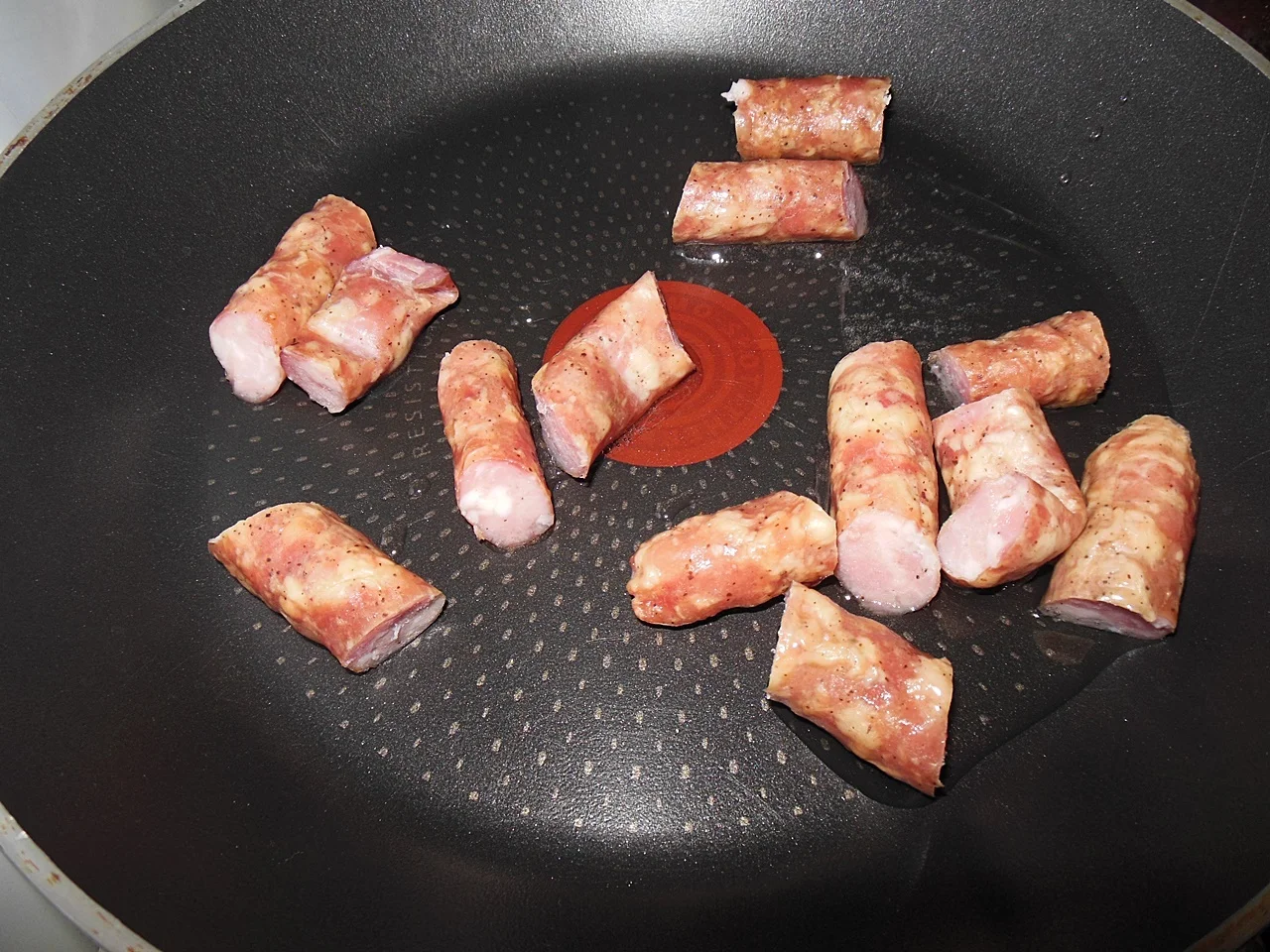 Hot skillet with eggs, peppers, and sausage