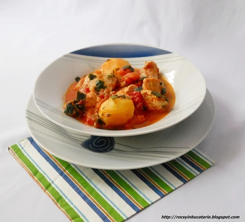 Chicken breast stew with tomato sauce and potatoes