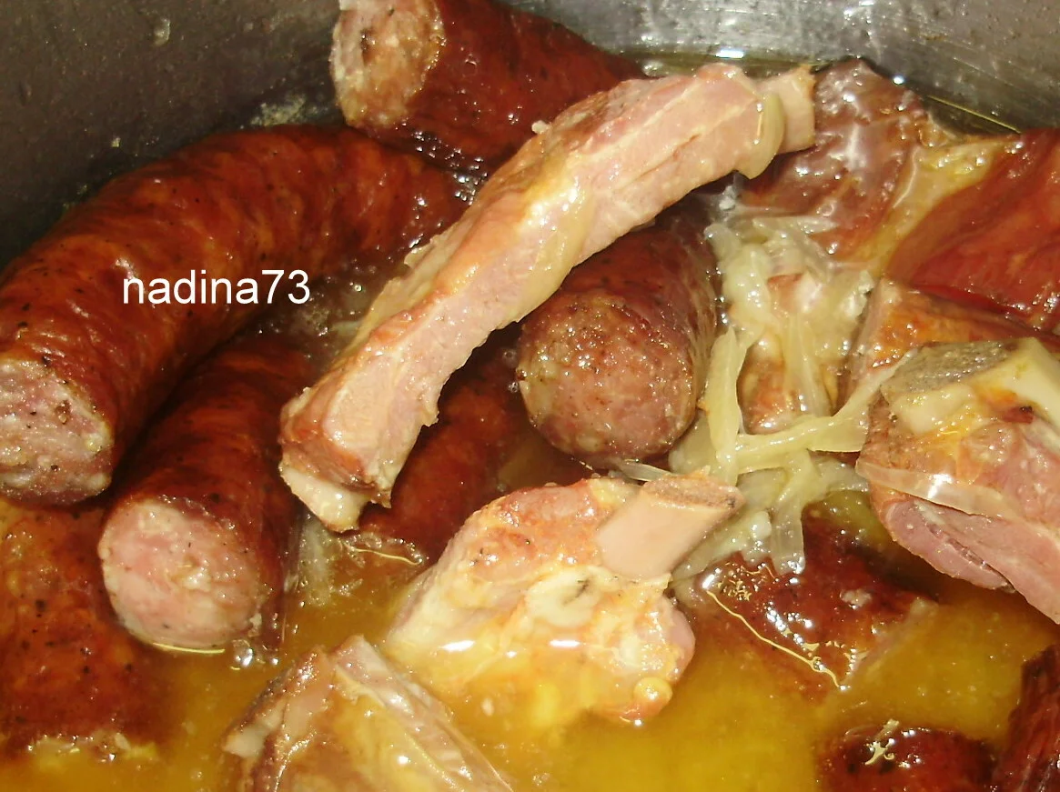 Smoked ribs and sausage with a couscous side dish