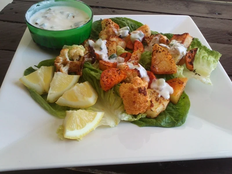 Oven-roasted vegetables with yogurt sauce