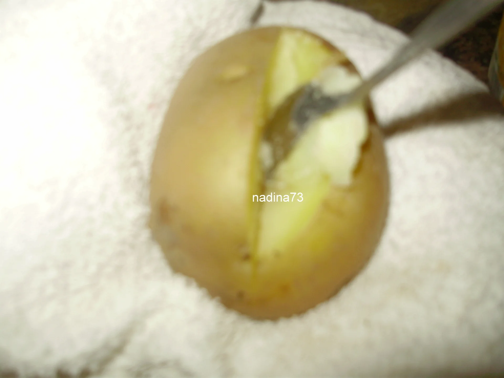 Baked potatoes stuffed with cheese