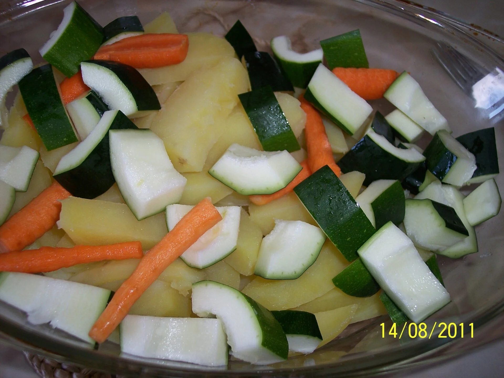 Potatoes with pumpkin and cheese baked in the oven