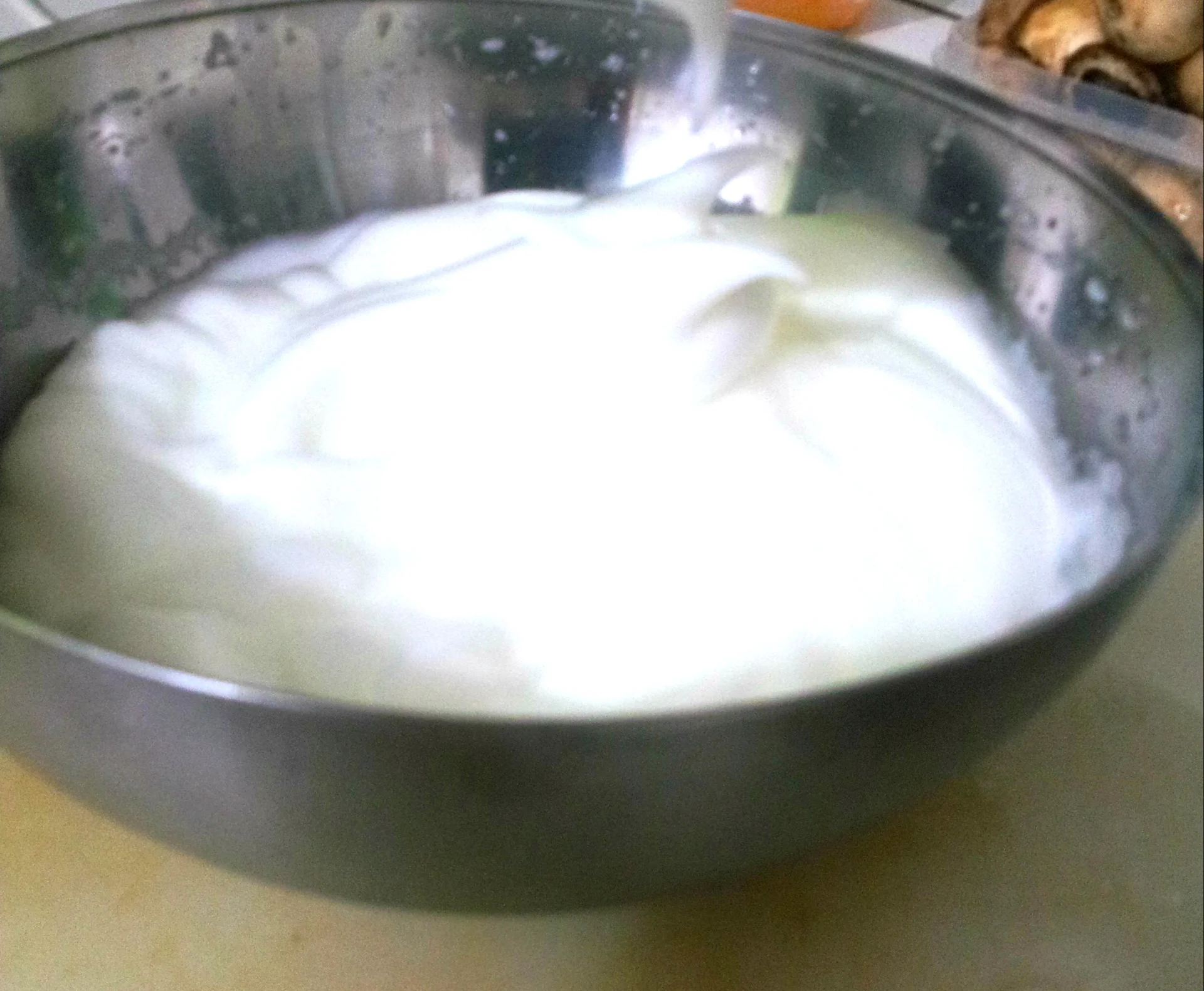 Meringue roll with cream cheese and raspberries