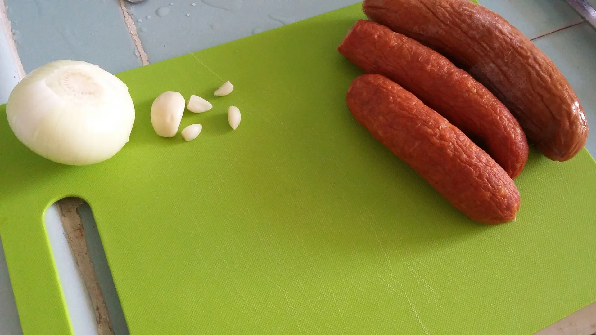 Baked pasta with sausages and cheese